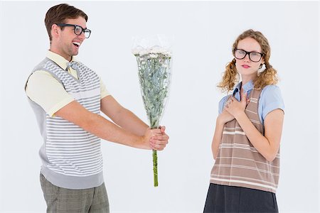 simsearch:400-08380794,k - Geeky hipster offering flowers to his girlfriend on white background Stockbilder - Microstock & Abonnement, Bildnummer: 400-08018056