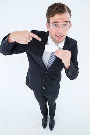 simsearch:400-04861869,k - Geeky businessman showing card on white background Foto de stock - Royalty-Free Super Valor e Assinatura, Número: 400-08018095