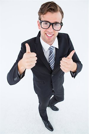 simsearch:400-04861869,k - Geeky hipster smiling at camera with thumbs up on white background Foto de stock - Royalty-Free Super Valor e Assinatura, Número: 400-08018091