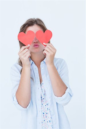 simsearch:400-07686530,k - Woman holding heart cards on white background Foto de stock - Royalty-Free Super Valor e Assinatura, Número: 400-08018349