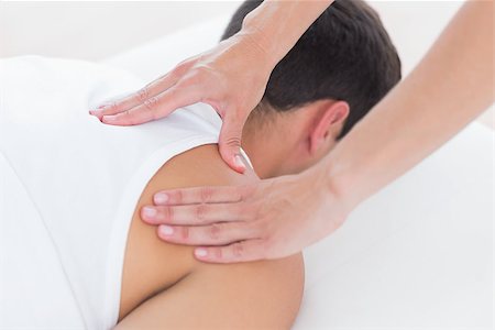 physical therapy shoulder - Physiotherapist doing shoulder massage in medical office Stock Photo - Budget Royalty-Free & Subscription, Code: 400-08018806