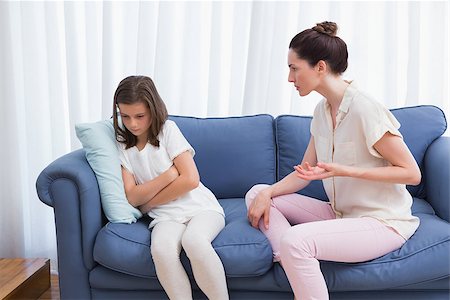 Mother scolding her naughty daughter at home in the living room Stock Photo - Budget Royalty-Free & Subscription, Code: 400-08019978