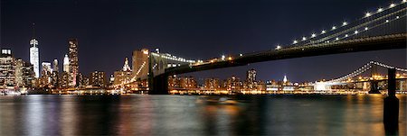 Twilight as the sun sets over Lower Manhattan. Famous New York landmarks Fotografie stock - Microstock e Abbonamento, Codice: 400-08011377