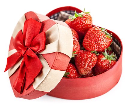 Fresh strawberries in box with bow gift on valentines day. Isolated on white background Stock Photo - Budget Royalty-Free & Subscription, Code: 400-08011463