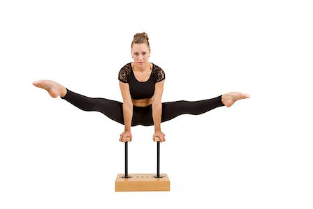 flexible young girl gymnast - beauty contortionist practicing gymnastic yoga isolated on white background, Young professional gymnast woman Stock Photo - Budget Royalty-Free & Subscription, Code: 400-08011562