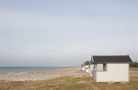 simsearch:400-06638821,k - Beach Huts in a row close to water Photographie de stock - Aubaine LD & Abonnement, Code: 400-08011725