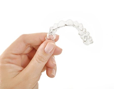 Invisible braces in a woman's hand Stock Photo - Budget Royalty-Free & Subscription, Code: 400-08011777