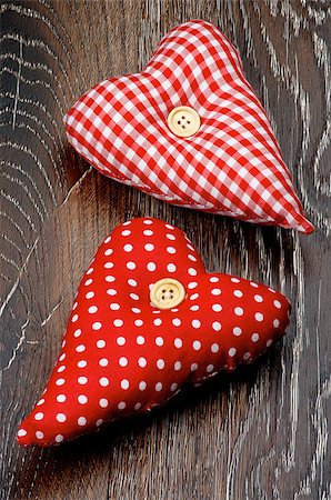 simsearch:400-07954156,k - Two Handmade Textile Valentine Red Polka Dot Hearts closeup on Dark Wooden background Foto de stock - Royalty-Free Super Valor e Assinatura, Número: 400-08011828