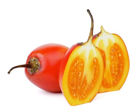 Exotic Tropical Fruits Two Halves and Full Body Tamarillo isolated on white background Foto de stock - Super Valor sin royalties y Suscripción, Código: 400-08012356