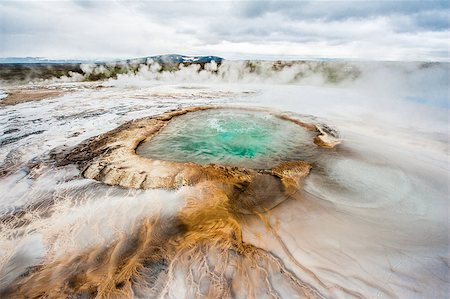 fyletto (artist) - Pool with boiling geothermal water at Hveravellir is actually in the heart of Iceland. Photo taken around midnight with a storm coming Stock Photo - Budget Royalty-Free & Subscription, Code: 400-08012964