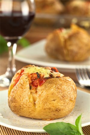 Stuffed baked potato with tomato and cheese Stock Photo - Budget Royalty-Free & Subscription, Code: 400-08013182