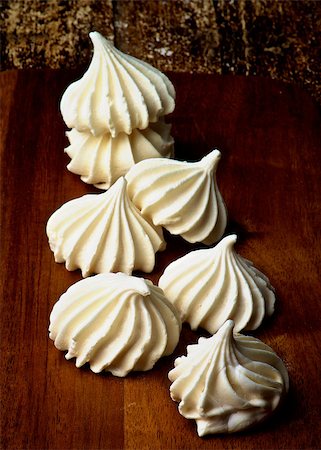 simsearch:400-07420117,k - Arrangement of Vanilla Meringues Cakes In a Row on Wooden Background Stock Photo - Budget Royalty-Free & Subscription, Code: 400-08013833