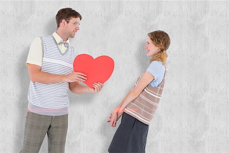 simsearch:400-08380794,k - Geeky hipster giving heart card to his girlfriend  against white background Stockbilder - Microstock & Abonnement, Bildnummer: 400-08020433