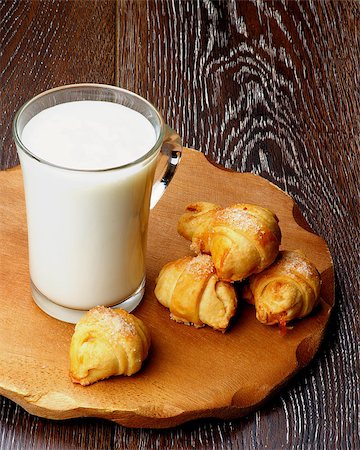 simsearch:400-07420117,k - Homemade Croissant Cookies with Jam  and Glass Cup of Milk on Wooden Plate closeup on Rustic Wooden background Stock Photo - Budget Royalty-Free & Subscription, Code: 400-08020672
