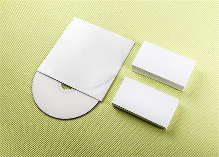 simsearch:400-06462302,k - Blank business cards and compact disk on a green background. Template for ID Stock Photo - Budget Royalty-Free & Subscription, Code: 400-08021333