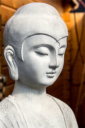 Garden buddha Statue detail background Stock Photo - Budget Royalty-Free & Subscription, Code: 400-08021448