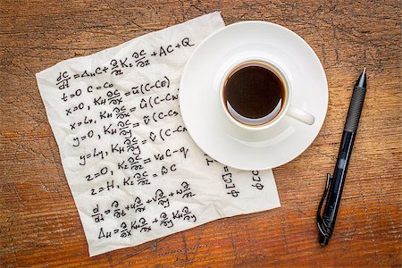 science hand writing - mathematical equations of physics - handwriting on a napkin with a cup of coffee on a rustic wooden table Stock Photo - Budget Royalty-Free & Subscription, Code: 400-08022148