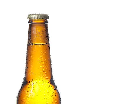 simsearch:400-07165360,k - bottle of fresh beer with drops, isolated with space for text on white background Foto de stock - Royalty-Free Super Valor e Assinatura, Número: 400-08034192