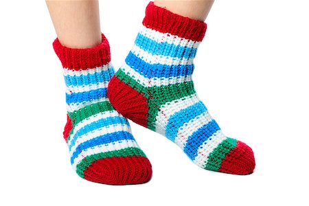 simsearch:400-04780463,k - Children feet clothed in colorful socks on white background Foto de stock - Super Valor sin royalties y Suscripción, Código: 400-08034251