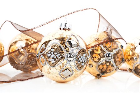 simsearch:400-05307881,k - Luxurious christmas still life with antique golden baubles and brown ribbon on white background. Stock Photo - Budget Royalty-Free & Subscription, Code: 400-08034404