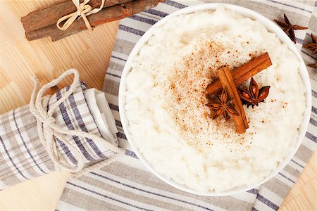 simsearch:400-08034414,k - Delicious rice pudding with cinnamon and star anise. Luxurious sweet dessert concept. Stock Photo - Budget Royalty-Free & Subscription, Code: 400-08034417