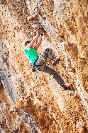 simsearch:400-07292725,k - Rock climber on a face of a cliff Photographie de stock - Aubaine LD & Abonnement, Code: 400-08034503