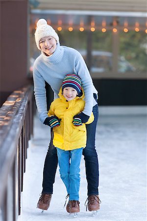 happy mother and her little son having fun ice skating together at winter Stock Photo - Budget Royalty-Free & Subscription, Code: 400-08034844