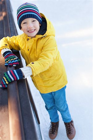simsearch:400-08318057,k - smiling little boy having fun at winter ice skating Stock Photo - Budget Royalty-Free & Subscription, Code: 400-08034855