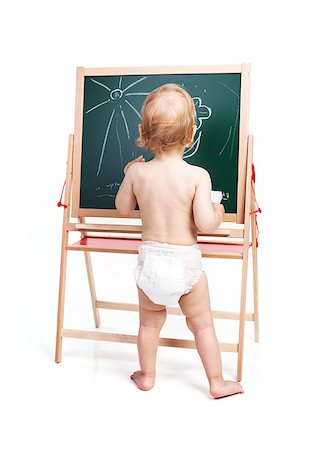 Baby boy drawing on chalkboard over white Stock Photo - Budget Royalty-Free & Subscription, Code: 400-08035015