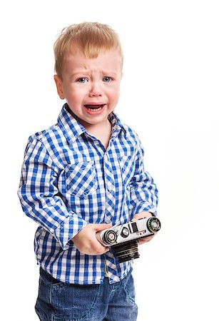 simsearch:400-07506232,k - Toddler boy holding camera and crying Stock Photo - Budget Royalty-Free & Subscription, Code: 400-08035023