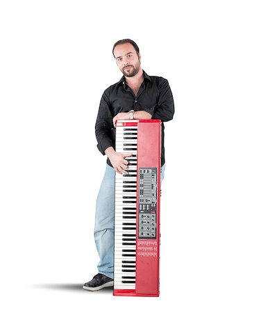 simsearch:693-03557273,k - A musician and his inseparable red piano Photographie de stock - Aubaine LD & Abonnement, Code: 400-08035059