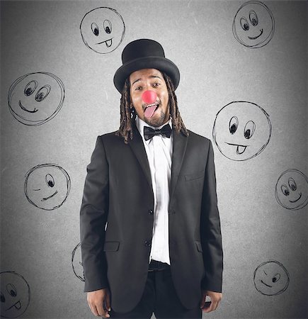 rastafarian - Man grimacing with hat and clown nose Stock Photo - Budget Royalty-Free & Subscription, Code: 400-08035098