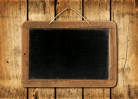 slate with chalk - Blackboard on a old wood wall background texture Stock Photo - Budget Royalty-Free & Subscription, Code: 400-08035305