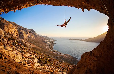 simsearch:400-07292725,k - Silhouette of a rock climber falling of a cliff while lead climbing Photographie de stock - Aubaine LD & Abonnement, Code: 400-08035461