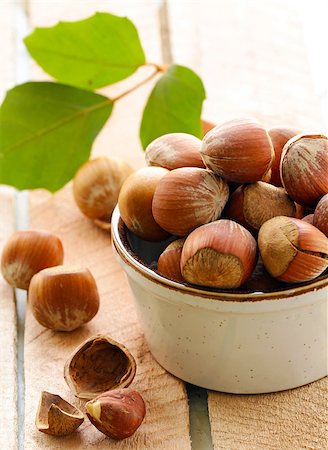 simsearch:400-06520688,k - natural organic hazelnuts in a bowl on the table Stock Photo - Budget Royalty-Free & Subscription, Code: 400-08035779