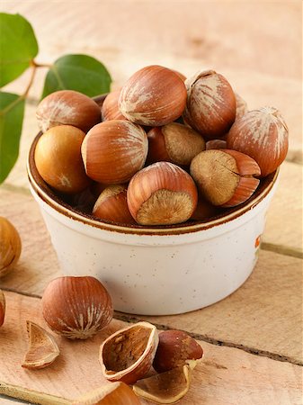simsearch:400-06520688,k - natural organic hazelnuts in a bowl on the table Stock Photo - Budget Royalty-Free & Subscription, Code: 400-08035780