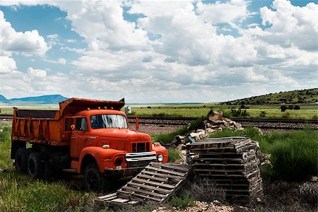 raulmellado (artist) - Old red country truck near of train tracks. Foto de stock - Royalty-Free Super Valor e Assinatura, Número: 400-08035923