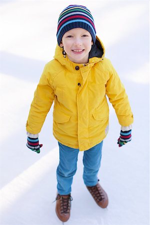 simsearch:400-08318057,k - little boy enjoying ice skating at winter at outdoor skating rink Stock Photo - Budget Royalty-Free & Subscription, Code: 400-08035932