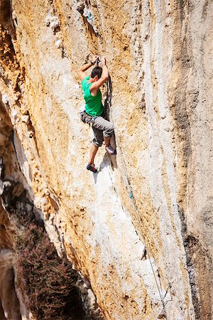 simsearch:400-07292725,k - Rock climber on a face of a cliff Photographie de stock - Aubaine LD & Abonnement, Code: 400-08036324