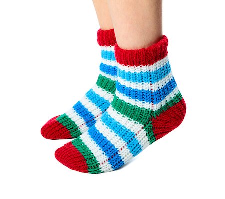 simsearch:400-04780463,k - Children feet clothed in colorful socks on white background Foto de stock - Super Valor sin royalties y Suscripción, Código: 400-08036407