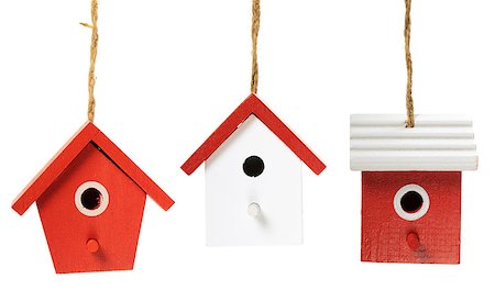 empty birds nest - Three painted birdhouses hanging on white background Stock Photo - Budget Royalty-Free & Subscription, Code: 400-08036420