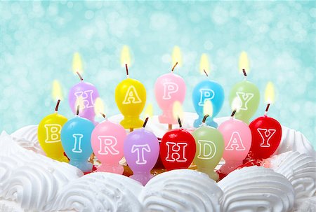 Birthday cake with candles on abstract blurred background Stock Photo - Budget Royalty-Free & Subscription, Code: 400-08036442