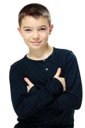 simsearch:400-08036451,k - Portrait of handsome eleven years old boy with crossed arms on white background Stock Photo - Budget Royalty-Free & Subscription, Code: 400-08036443