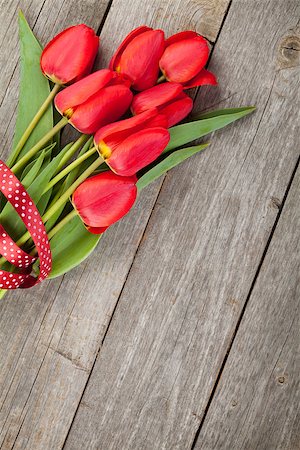simsearch:400-08036453,k - Fresh red tulips bouquet over wooden table background with copy space Stock Photo - Budget Royalty-Free & Subscription, Code: 400-08037226