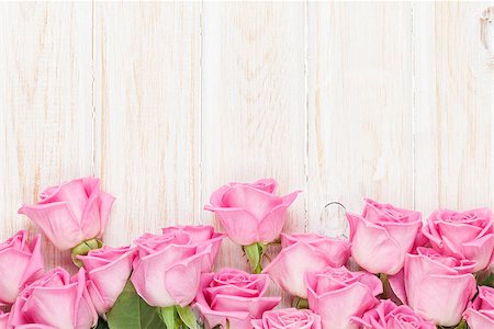 simsearch:400-08110734,k - Valentines day background with pink roses over wooden table. Top view with copy space Stock Photo - Budget Royalty-Free & Subscription, Code: 400-08037278