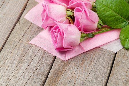 simsearch:400-08110734,k - Garden pink roses bouquet over wooden table. Top view with copy space Stock Photo - Budget Royalty-Free & Subscription, Code: 400-08037285