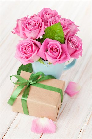 simsearch:400-08110734,k - Valentines day pink roses bouquet and gift box on white wooden table Stock Photo - Budget Royalty-Free & Subscription, Code: 400-08037288
