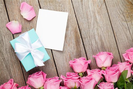 simsearch:400-08110734,k - Pink roses and valentines day greeting card or photo frame and gift box over wooden table. Top view with copy space Stock Photo - Budget Royalty-Free & Subscription, Code: 400-08037281