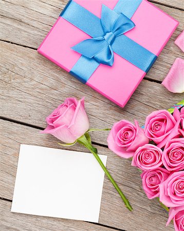 simsearch:400-08110734,k - Pink roses and valentines day greeting card or photo frame and gift box over wooden table. Top view with copy space Stock Photo - Budget Royalty-Free & Subscription, Code: 400-08037295