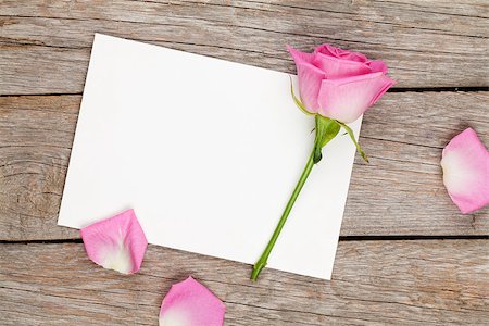 simsearch:400-08110734,k - Valentines day greeting card or photo frame and pink rose over wooden table. Top view with copy space Stock Photo - Budget Royalty-Free & Subscription, Code: 400-08037292